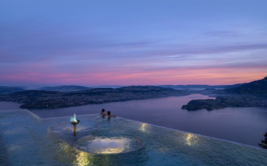 Pool overlooking ocean in Switzerland